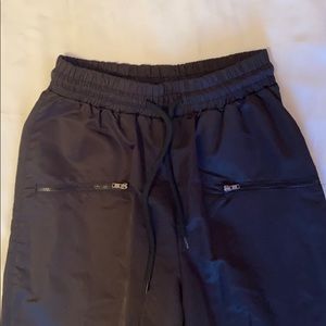 Black, nylon and mesh track pants